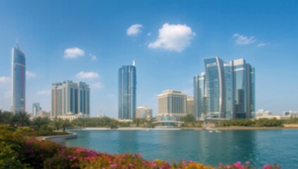 Fototapeta premium Out-of-focus skyscrapers under a clear blue sky