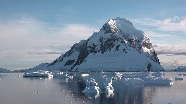 Stunning views of melting ice in the Arctic showcase the effects of climate change and global warming. The changing landscape highlights the urgency of environmental awareness.