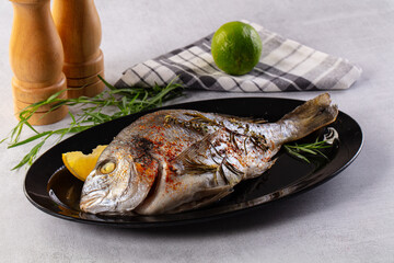 Baked dorada fish with spices