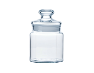 An empty, transparent glass apothecary jar with a round, knobbed lid isolated on black