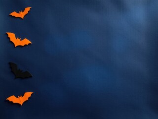 Vertical row of paper bats on dark blue background