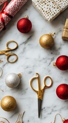 Christmas decorations and gift-wrapping supplies on a marble surface. Red, gold, and silver ornaments, scissors, and wrapped gifts are arranged with copy space.