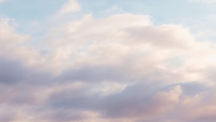Fototapeta premium Soft, out-of-focus cloudy sky with a gentle pastel color gradient, abstract natural backdrop.