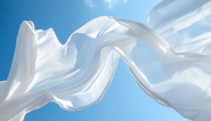The image shows a piece of white fabric billowing gently in a light breeze, set against a backdrop of a clear, vibrant blue sky.