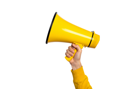 A hand, sleeve visible, holding a bright yellow megaphone, with a black background