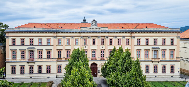 Esztergom, Hungary - August 21, 2025: Historic facade of the Balassa B&aacute;lint vocational secondary and technical school, located close to the famous Esztergom basilica.