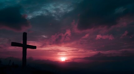 A solitary wooden cross is silhouetted against a dramatic vibrant pink and blue sunset sky