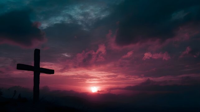 A solitary wooden cross is silhouetted against a dramatic vibrant pink and blue sunset sky