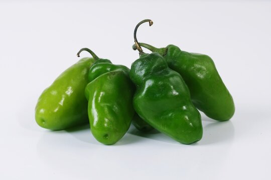 Fresh green cabe gendot chili peppers or Green Habanero Chili Peppers  isolated on white background.