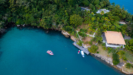Naklejka premium Tropical Island Paradise In Paraty Brazil South America Coastal Beach Landscape With Blue Ocean Water Summer Vacation Destination Travel And Nature