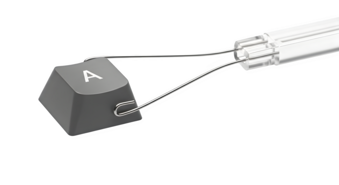 Keyboard key being removed with a key puller isolated on transparent background tool used to remove the keycap from a mechanical keyboard for cleaning