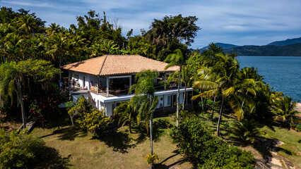 Fototapeta premium Tropical Island Paradise In Paraty Brazil South America Coastal Beach Landscape With Blue Ocean Water Summer Vacation Destination Travel And Nature