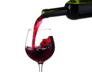 A bottle of crimson liquid being poured into a stemmed glass on a stark black backdrop