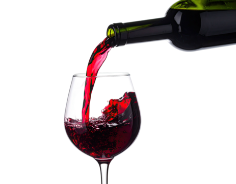 A bottle of crimson liquid being poured into a stemmed glass on a stark black backdrop