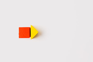 Wooden Red Cube and Yellow Triangle Arrow