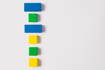 Colorful Stacked Wooden Blocks on White Background