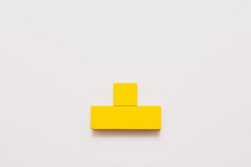 Minimal Yellow Wooden Blocks on White Background