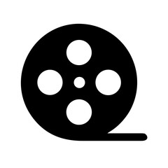 Fototapeta premium Minimalist black silhouette vector icon of a film reel, symbolizing cinema, movie production, filmmaking, and entertainment industry. Isolated on a transparent background