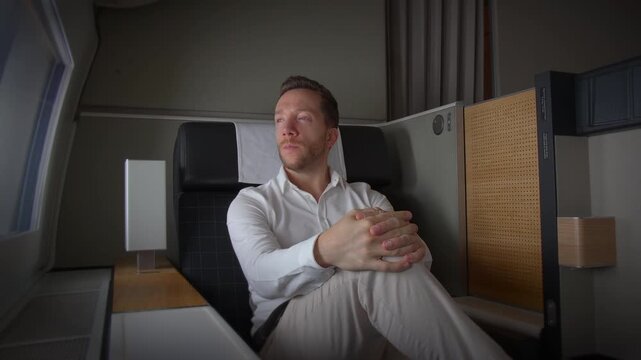 A Relaxing Passenger Enjoying a Comprehensive InFlight Entertainment Experience