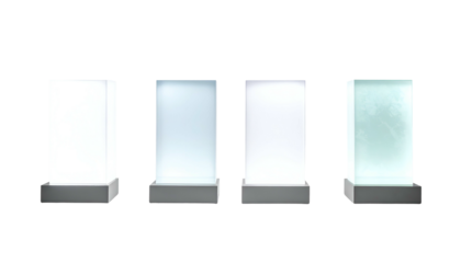 Four illuminated, rectangular pedestals on a black background, varying in light intensity and textures