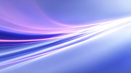 Abstract light trails in blue and purple hues at night