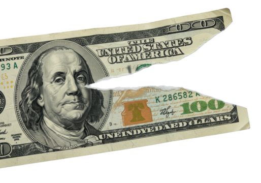 Extreme close-up of a meticulously torn US 100 dollar bill on transparent background, highlighting feathery fibers, intaglio inks & security strip, concept of financial fragility