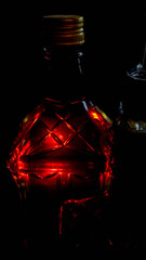 dark mystical theme red whine bottle