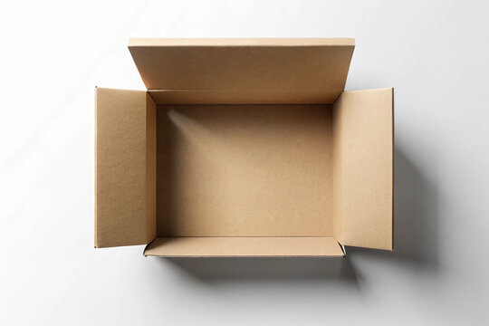 Open cardboard box with blank space: Overhead view of an open cardboard box, revealing empty interior. The neutral backdrop complements the simplicity of the box.