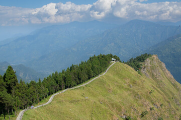 Naklejka premium View of Tarey Bhir point, popular tourist spot, Sikkim, India.The word 'Bhir' means cliff in the local Nepal language,about 10,000 feet long path, a breathtaking view at the edge, Himalayan mountains.