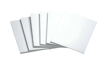 A stack of blank white papers fanned out against a black background, with subtle shadows