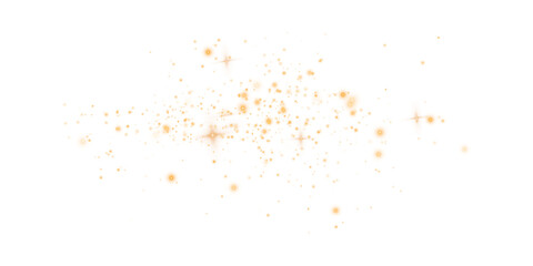 Gold sparks and stars glitter with a special light effect. Sparkles on a transparent background. Christmas abstract.