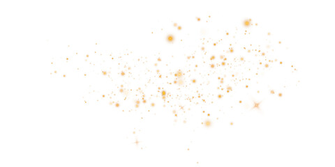 Gold sparks and stars glitter with a special light effect. Sparkles on a transparent background. Christmas abstract.