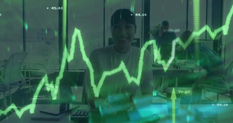 Typing female analyst using keyboard by monitor at corporate office showing financial chart overlay