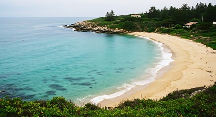 Serene Tropical Cove with Turquoise Waters and Lush Greenery Overlooking Sandy Beach.