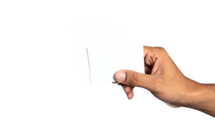 Hand holding three blank white cards against a black background; the hand is the focus