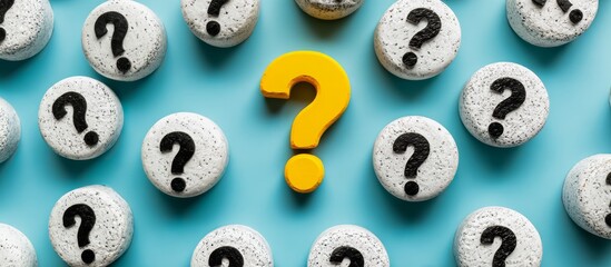 Blue background with many white and yellow questions. The yellow question is in the middle of the white questions