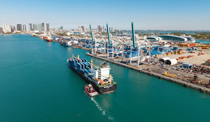 Miami, Florida, USA - March 20, 2025: Freight container on cargo vessel. Cargo ship vessel. Miami port. Container ship. Cargo Warnow Whale Limassol ship with container in Miami. Commercial vessel © be free