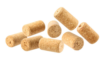 Close-up of a small pile of cylindrical corks, isolated on a black background