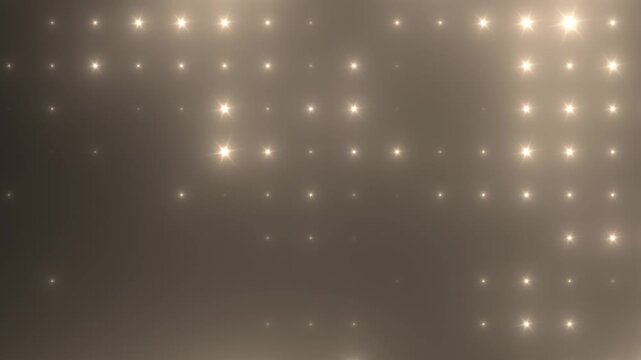 Abstract loop glowing yellow orange disco wall with bright light bulbs