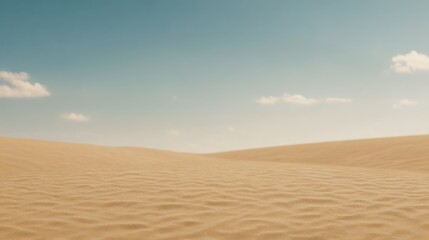 Naklejka premium A vast, tranquil desert landscape featuring gentle sand dunes under a clear blue sky with a few scattered clouds.