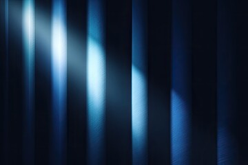Abstract vertical lines bathed in cool-toned blue light, creating depth and a sense of drama
