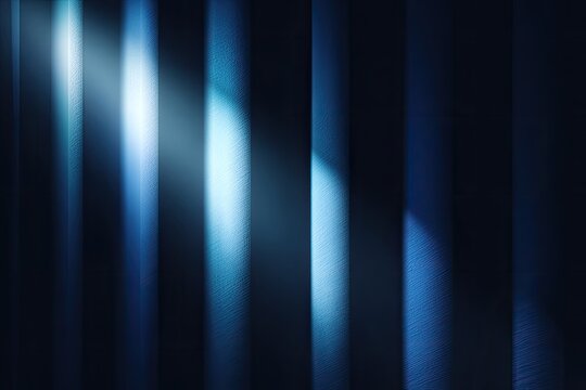 Abstract vertical lines bathed in cool-toned blue light, creating depth and a sense of drama