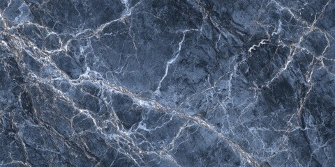 Obraz premium A close-up view of a polished, dark-blue marble surface with prominent white veining and streaks