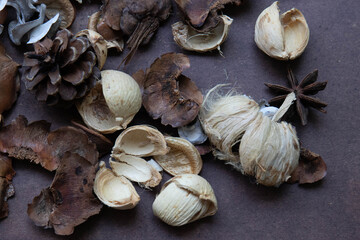 a bowl of potpourri, which is a mixture of dried, natural plant materials used to provide a pleasant scent or visual decoratio