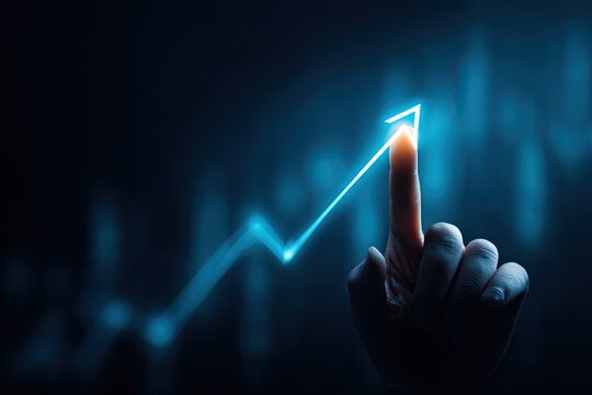 Hand pointing upward, illuminating a glowing arrow with abstract blue background