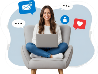 Smiling young woman comfortably seated in an armchair using a laptop with social media icons representing email chat user profile and likes appearing around her head