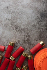 Clay disc flying target and shotgun shells on texture background , Gun shooting game © Suttiwan