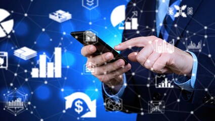 Businessman using smartphone for financial analysis and data.