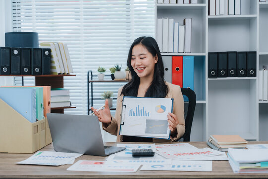 Asian Businesswoman Presenting Data Online