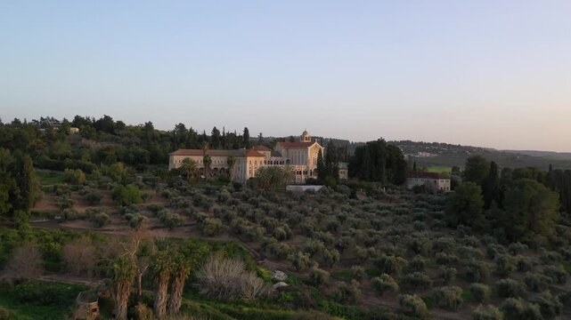 Aerial view of the Monastery of the Silent Ones located in Latrun at the southeastern end of the Ayalon Valley at sunset in Israel